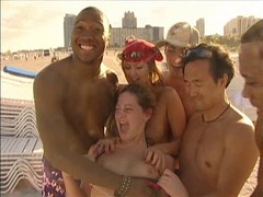 Kinky girls tease hard in a hot voyeur beach group fun